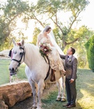 Bride on Horseback
Photography: Amanda McKinnon Photography
Read More:
http://www.insideweddings.com/weddings/bride-wears-claire-pettibone-gown-to-bohemian-outdoor-wedding/668/ Bride in a Claire Pettibone dress with gold and silver embroidery sits on white horse, groom