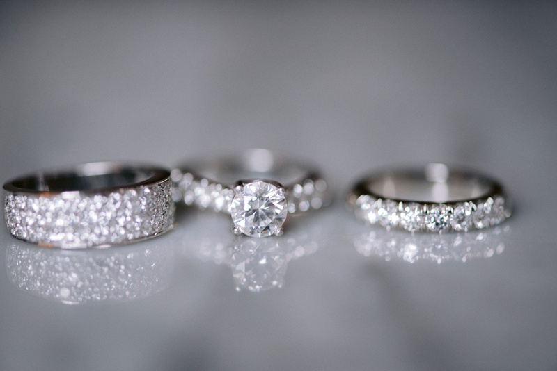 Sparkling Rings
Photography: Kesha Lambert Photography
Read More:
http://www.insideweddings.com/weddings/personalized-ceremony-with-pink-florals-at-a-loft-in-new-york-city/1210/ round diamond engagement ring, pavé band, eternity band, diamond men's bands
