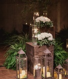 Lanterns and Ferns at Ceremony
Photography: Shaun Menary Photography
Read More:
http://www.insideweddings.com/weddings/outdoor-elements-in-lavish-modern-wedding-of-childhood-sweethearts/802/ ceremony decor with candles in lanterns, ferns, and white flowers