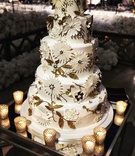 Five-Layer Cake with Floral Appliques
Photography: KingenSmith
Read More:
http://www.insideweddings.com/weddings/modern-jewish-wedding-with-unique-details-and-deep-color-palette/929/ five layer wedding cake with fondant flower appliques