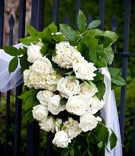 All-White Floral Decoration
Photography: Jay Lawrence Goldman Photography
Read More:
http://www.insideweddings.com/weddings/usc-couples-french-inspired-wedding-in-beverly-hills/328/ White roses and hydrangeas on wrought-iron gate