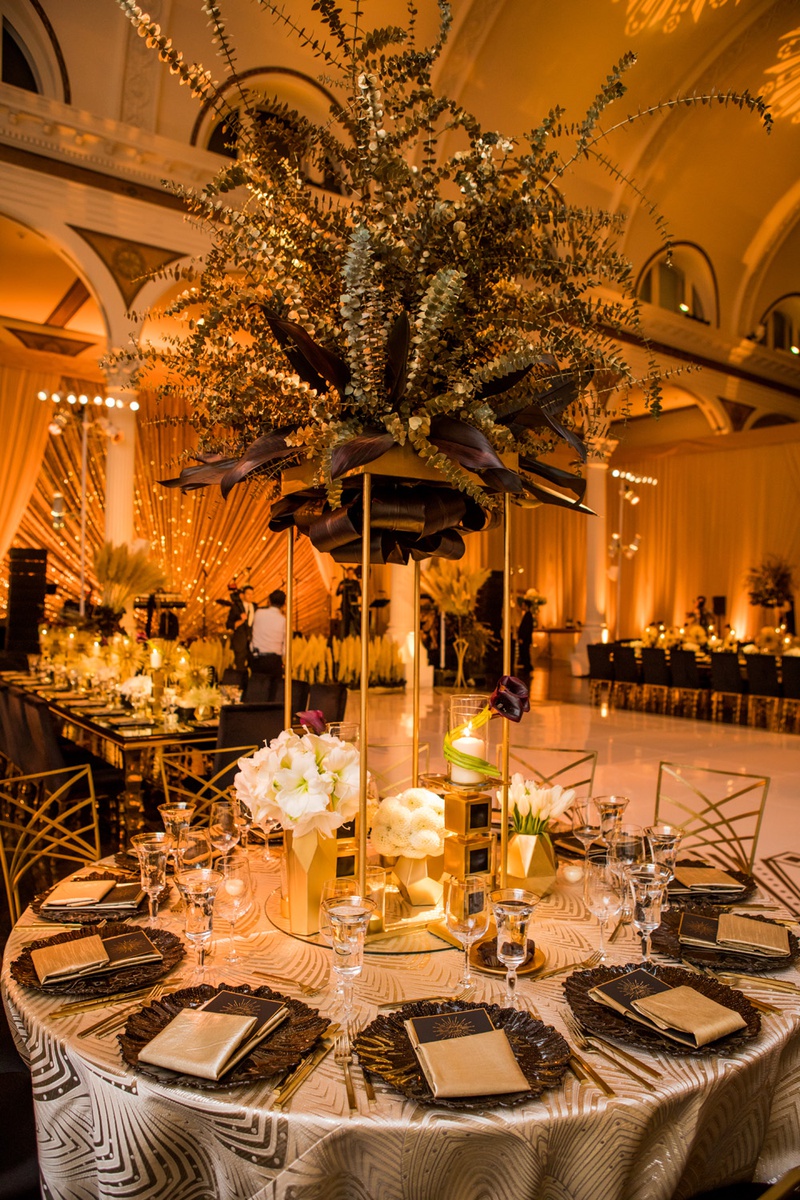Gold Painted Centerpieces
Photography: Laura Grier of Beautiful Day Photography
Read More:
http://www.insideweddings.com/weddings/glamorous-art-deco-inspired-wedding-in-downtown-los-angeles/1162/ vibiana wedding reception, gold spray painted eucalyptus leaves, gold stand
