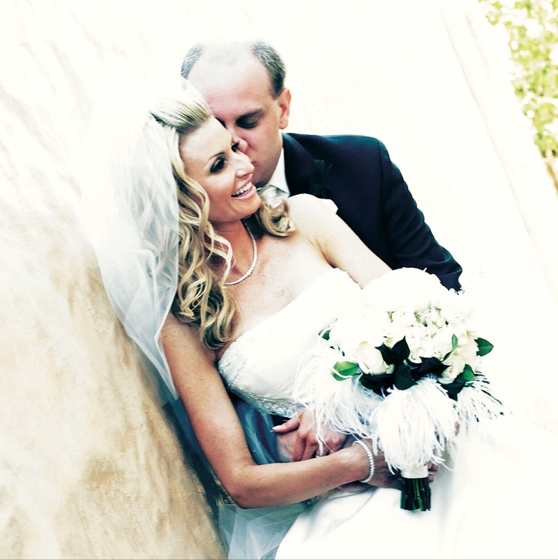 The Bride and Groom
Photography: Tony Florez Photography
Read More:
http://www.insideweddings.com/weddings/peacock-feather-themed-wedding-in-santa-barbara-california/166/ Woman in strapless gown carrying white bouquet