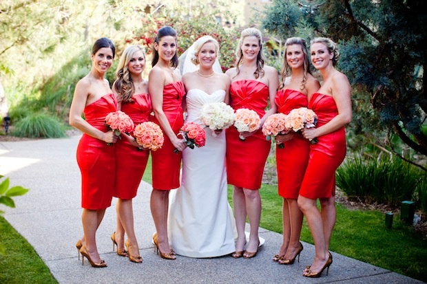 The Bride and Her Bridesmaids
Photography: Vallentyne Photography
Read More:
http://www.insideweddings.com/weddings/spring-wedding-at-the-lodge-at-torrey-pines/388/ Short red-orange bridesmaid dresses and bouquets