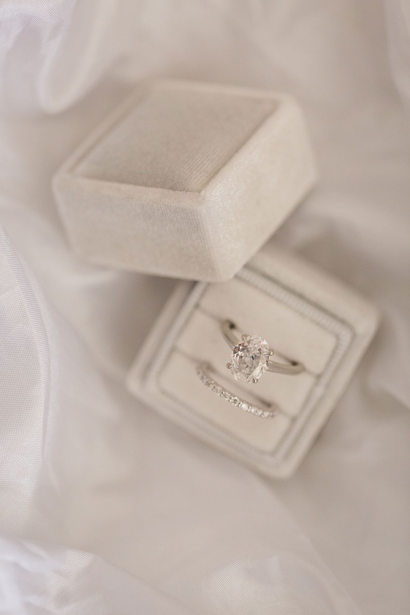 Oval Solitaire Engagement Ring %26 Band
Photography: Aevitas Weddings
Read More:
http://www.insideweddings.com/weddings/rooftop-ceremony-ballroom-reception-with-english-garden-theme/1286/ wedding ring pave diamonds oval cut engagement ring solitaire platinum white gold band grey velvet
