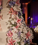 Sugar Flower Wedding Cake
Photography: Nancy Cohn Photography
Read More:
http://www.insideweddings.com/weddings/florida-sunset-inspired-wedding-at-the-breakers-palm-beach/391/ Lily, orchid, rose flowers hand made of sugar paste