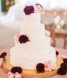 White Cake with Fresh Dahlias %26 Roses
Photography: Lauren Gabrielle Photography
Read More:
http://www.insideweddings.com/weddings/lovely-country-club-summer-wedding-with-tent-reception-in-ohio/1018/ Wedding cake four layer white design fresh flowers dahlia garden rose pink burgundy gold stand