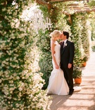 Bride and Groom Kissing
Photography: Elizabeth Messina
Read More:
http://www.insideweddings.com/weddings/spring-garden-wedding-in-montecito-california/277/ Couple kiss outside under crystal chandelier