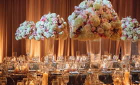 Wedding Reception with Tall Florals
Photography: Jess + Nate Studios
Read More:
http://www.insideweddings.com/weddings/museum-wedding-with-gorgeous-rooftop-ceremony-in-washington-dc/1101/ Wedding reception with tall flower arrangements glass crystal vases gold linens candles drapery