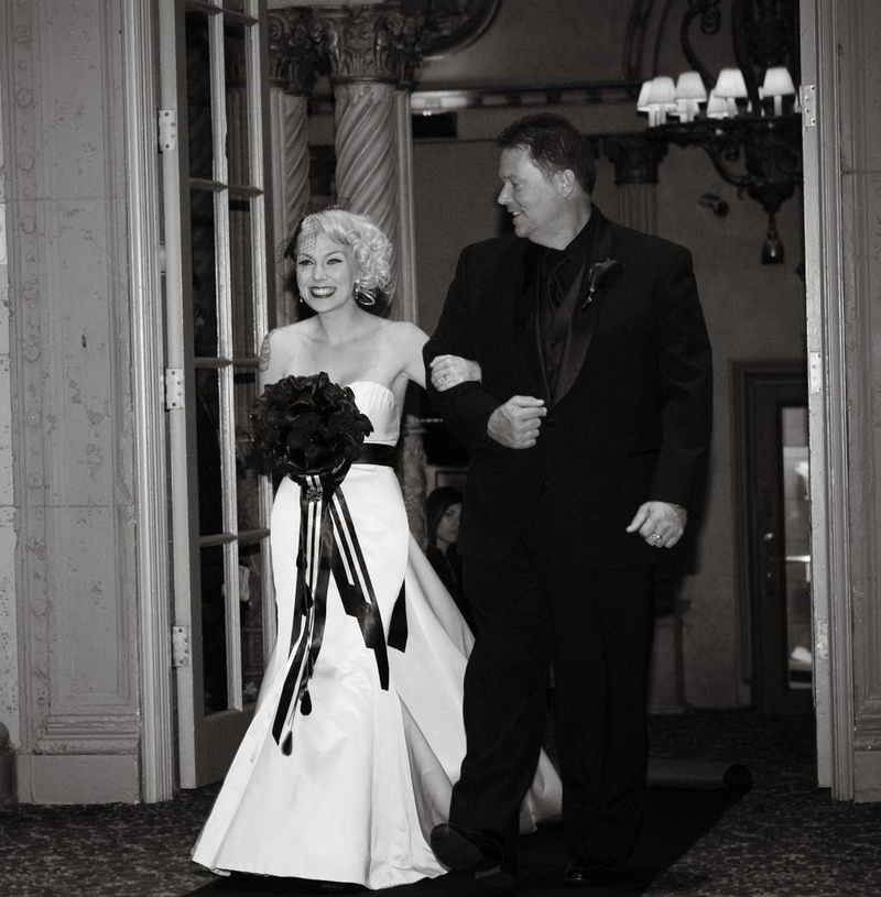 Bride Enters Ceremony
Photography: Barnet Photography
Read More:
http://www.insideweddings.com/weddings/ashley-reeves-and-brandon-saller/261/ Black and white photo of bride in an Alvina Valenta gown being escorted to ceremony