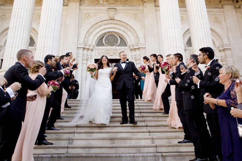 Guests Blowing Bubbles After Ceremony
Photography: Amanda Sudimack for Artisan Events
Read More:
http://www.insideweddings.com/weddings/customized-chicago-wedding-with-pink-blush-marsala-color-palette/911/ After ceremony bride and groom walk down steps with bubbles blowing from guests