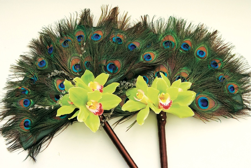 Peacock Feather Bouquets
Photography: Tony Florez Photography
Read More:
http://www.insideweddings.com/weddings/peacock-feather-themed-wedding-in-santa-barbara-california/166/ Stick of green and blue feathers with orchid