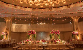 Ballroom Reception with Hanging Roses
Photography: Jay Lawrence Goldman Photography
Read More:
http://www.insideweddings.com/weddings/outdoor-ceremony-ballroom-reception-with-pink-flowers-greenery/1135/ Wedding reception at the beverly hills hotel ballroom crystal chandelier with pink roses hanging