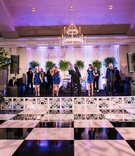 Black %26 White Checkered Dance Floor %26 Stage
Photography: Vue Photography
Read More:
http://www.insideweddings.com/weddings/a-wedding-planners-personalized-celebration-at-a-historic-mansion/824/ White and black checkerboard dance floor in front of live band stage blue sequin dresses black suits