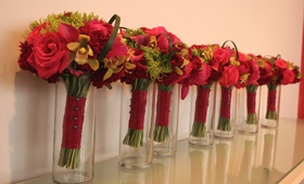 Vibrant Bridesmaid Bouquets
Photography: E Photography
Read More:
http://www.insideweddings.com/weddings/festive-bright-june-wedding-in-minneapolis-minnesota/144/ Vases in a line filled with bridesmaids bouquet