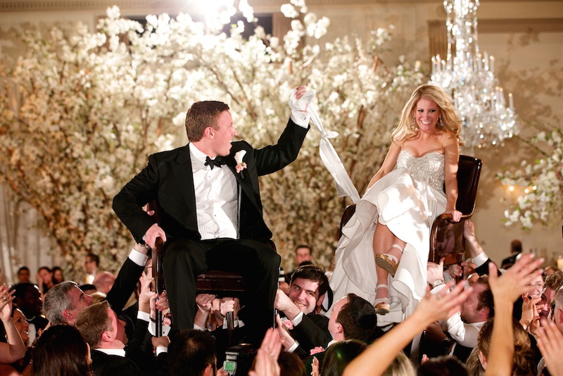Bride %26 Groom's Hora Dance
Photography: Bob %26 Dawn Davis Photography
Read More:
http://www.insideweddings.com/weddings/glamorous-ivory-blush-spring-wedding-at-a-private-club-in-chicago/685/ Groom in a black tuxedo & bride in a strapless Pnina Tornai dress hora dance