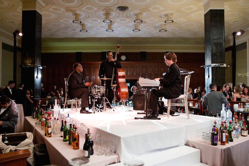 Cocktail Hour Entertainment
Photography: Bob %26 Dawn Davis Photography
Read More:
http://www.insideweddings.com/weddings/glamorous-ivory-blush-spring-wedding-at-a-private-club-in-chicago/685/ Wedding cocktail hour with cello player, drummer, and keyboardist behind bar, The Standard Club