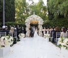 Bride & Groom Under Chuppah Outdoors