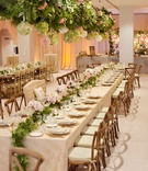 Head Table with Florals Overhead
Photography: Kortnee Kate Photography
Read More:
http://www.insideweddings.com/weddings/hometown-celebration-with-rustic-details-colorful-pastel-flowers/1035/ Rustic wedding ceremony greenery runner and chandeliers with hydrangea balls and greenery overhead
