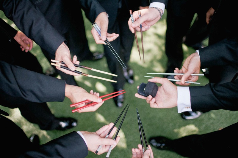 Chopstick Gifts
Photography: Harwell Photography
Read More:
http://www.insideweddings.com/weddings/romantic-woodland-inspired-atlanta-wedding-with-natural-details/433/ Groomsmen holding mismatched chopsticks