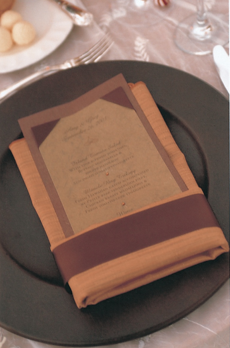 Green and Orange Place Setting
Photography: David Michael Photography
Read More:
http://www.insideweddings.com/weddings/tropical-seaside-wedding-in-lanai-hawaii/60/ orange napkin holds brown menu card
