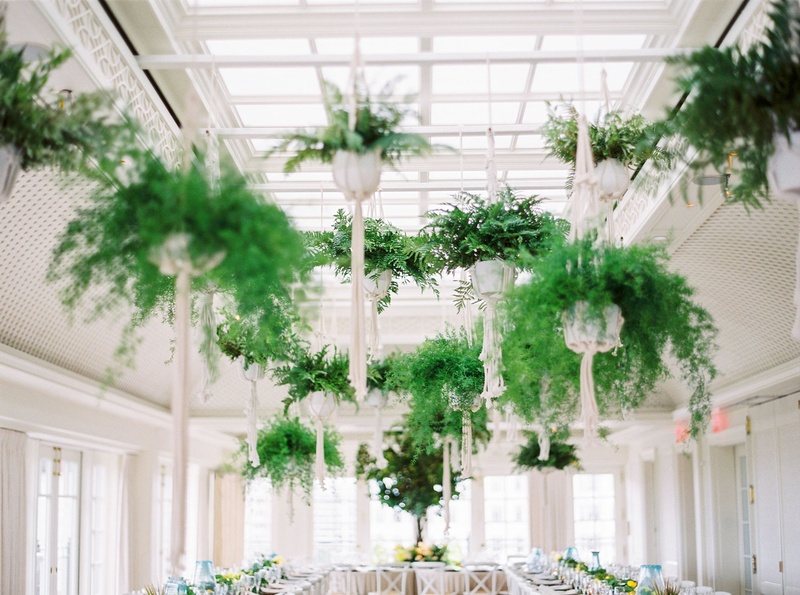 Ferns Hanging from Ceiling
Photography: Branco Prata
Read More:
http://www.insideweddings.com/weddings/chic-destination-wedding-with-california-style-in-washington-dc/1042/ Wedding reception California style ferns hanging over two long banquet tables in macrame holders