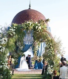 Glamorous Alfresco Vow Exchange
Photography: Mikel Healey Photography
Read More:
http://www.insideweddings.com/weddings/romantic-secret-garden-inspired-wedding-in-southern-california/1341/ resort at pelican hill wedding with blue drapery on rotunda, arches of floral and greenery