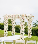 Ivory and Pink Florals on Chuppah
Photography: Jodee Debes Photography
Read More:
http://www.insideweddings.com/weddings/elegant-alfresco-ceremony-reception-with-parisian-elements/1176/ bel air bay club wedding, outdoor wedding ceremony on lawn, chuppah covered in flowers