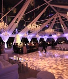 Elegant Tent Wedding
Photography: Elizabeth Messina
Read More:
http://www.insideweddings.com/weddings/georgetown-cupcake-cofounder-katherine-kallinis-california-wedding/405/ Patterned dance floor with white drapery and chandeliers