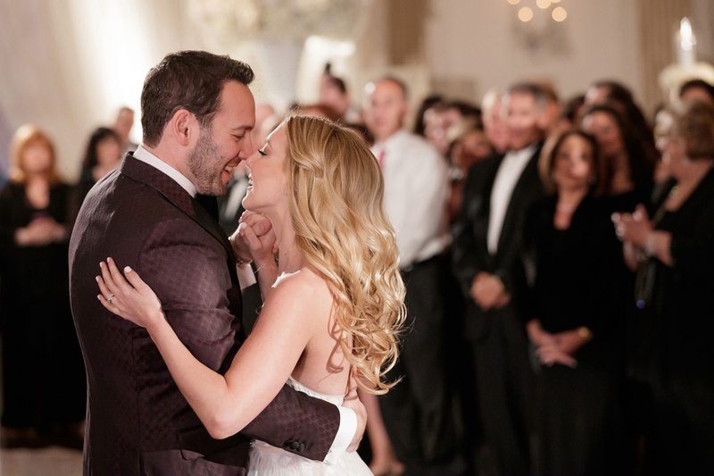 Sweet Photo of First Dance
Photography: Bob %26 Dawn Davis Photography
Read More:
http://www.insideweddings.com/weddings/modern-glamorous-jewish-wedding-with-unique-decor-in-chicago/1154/ wedding reception bride in mira zwillinger and groom in tuxedo first dance with guests watching