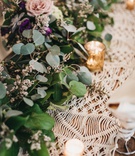 Macrame Runner and Floral Garland
Photography: Justin Johnson Photography
Read More:
http://www.insideweddings.com/weddings/metallic-dusty-purple-color-palette-at-venue-with-stunning-views/1305/ macrame runner topped with gold mercury votives and garland with eucalyptus