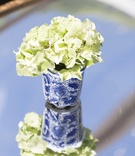 Blue-Detailed Floral Vase
Photography: Collin Pierson Photography
Read More:
http://www.insideweddings.com/weddings/southern-elegance-inspired-styled-shoot-with-playful-summer-details/837/ blue and white wedding décor, southern-inspired wedding vase with white flowers ginger jar