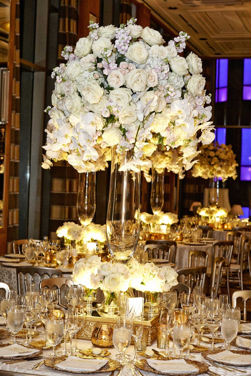 Tall White Floral Centerpieces
Photography: KingenSmith
Read More:
http://www.insideweddings.com/weddings/delicately-detailed-chicago-wedding-with-jewish-christian-customs/762/ tall white floral centerpieces arrangements gold and white detailing tablescapes