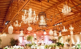 Variety of Chandeliers
Photography: Elizabeth Messina
Read More:
http://www.insideweddings.com/weddings/an-earthy-elegant-eclectic-wedding-with-rustic-elements/390/ Light fixtures suspended from exposed wood beams