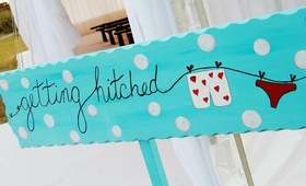 Getting Hitched Wedding Signage
Photography: Dara Blakeley Photography
Read More:
http://www.insideweddings.com/weddings/a-sweet-beachy-north-carolina-celebration/267/ Polka dot wedding ceremony sign