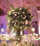 Verdant, Round Centerpiece
Photography: Nancy Cohn Weddings
Read More:
http://www.insideweddings.com/weddings/catholic-ceremony-organic-elegant-reception-at-the-breakers/1275/ round wedding centerpieces with lots of greenery and white flowers