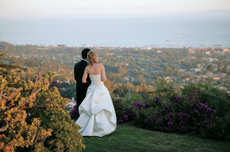 Couple on Ocean-View Bluff
Photography: Thomas J. Styczynski Photography
Read More:
http://www.insideweddings.com/weddings/alfresco-summer-wedding-in-santa-barbara-california/49/ Groom and bride in ball gown look out at ocean