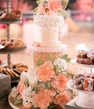 Wood Grain Wedding Cake
Photography: Michael Segal Photography
Read More:
http://www.insideweddings.com/weddings/rustic-elegant-wedding-in-ojai-valley-california/570/ Three layer cake with sugar flowers and lace