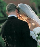 Bride and Groom Embrace
Photography: Paul Barnett Photographer
Read More:
http://www.insideweddings.com/weddings/at-home-spring-affair-in-southern-california/37/ Groom's black suit and bride's white veil