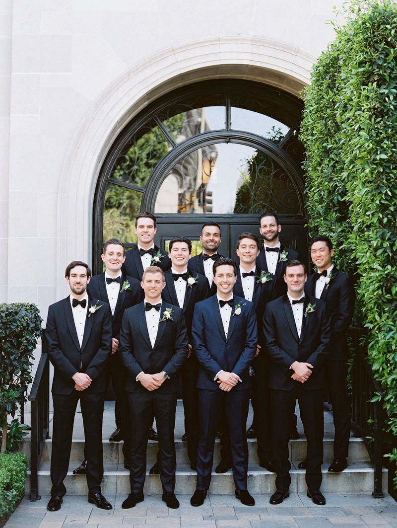 Groomsmen %26 Groom at Vibiana
Photography: Mallory Dawn Photography
Read More:
http://www.insideweddings.com/weddings/outdoor-jewish-ceremony-luxe-reception-at-vibiana-in-downtown-la/1259/ groom in navy tuxedo black bow tie with groomsmen in classic suits bow ties vibiana wedding venue la