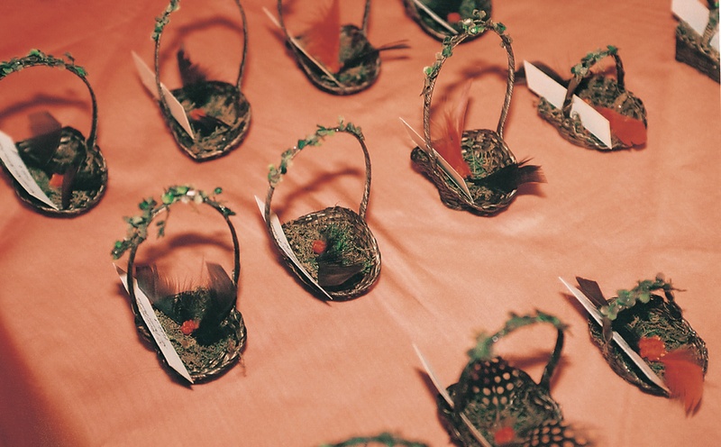 Tiny Basket Place Card Holders
Photography: Simone %26 Martin Photography
Read More:
http://www.insideweddings.com/weddings/a-midsummer-nights-dream-wedding-in-beverly-hills-california/58/ place card holders made from tiny baskets and feathers