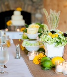 Rustic Wedding Décor
Photography: Realities Photography
Read More:
http://www.insideweddings.com/weddings/green-yellow-rustic-farm-wedding-in-north-carolina/500/ White reception table with burlap runner and wood table number