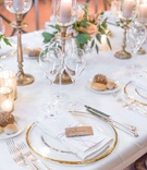 Place Card Tied with Red %26 White String
Photography: Bottega53
Read More:
http://www.insideweddings.com/weddings/destination-wedding-at-a-tuscan-style-villa-in-florence-italy/1181/ wedding reception gold rim charger plate kraft paper place card red white string bread plate