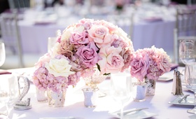 Glittery Table Number
Photography: Full Spectrum Photography
Read More:
http://www.insideweddings.com/weddings/a-modern-san-diego-hotel-wedding-with-purple-sparkling-details/672/ Wedding reception table with lavender tablecloth, roses, and hydrangeas, sparkly table number