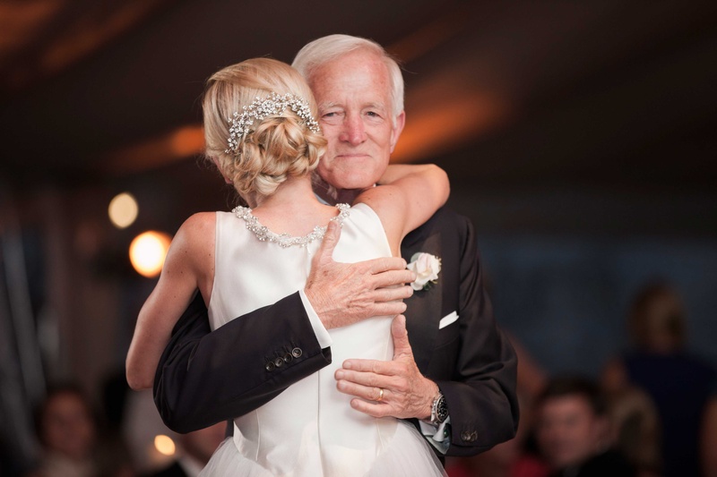 Bride Embraces Her Father at Reception
Photography: Michael Bambino %26 Co.
Read More:
http://www.insideweddings.com/weddings/whimsical-open-air-secret-garden-wedding-with-soft-spring-hues/777/ a blushing bride hugs her father after their father daughter dance at her wedding reception