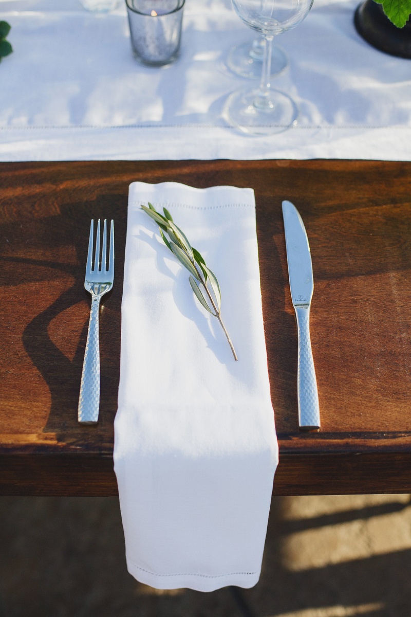 Simple Place Setting
Photography: Jasmine Star Photography
Read More:
http://www.insideweddings.com/weddings/spanish-style-ceremony-outdoor-ranch-wedding-reception/504/ Rustic wedding place setting with green sprig