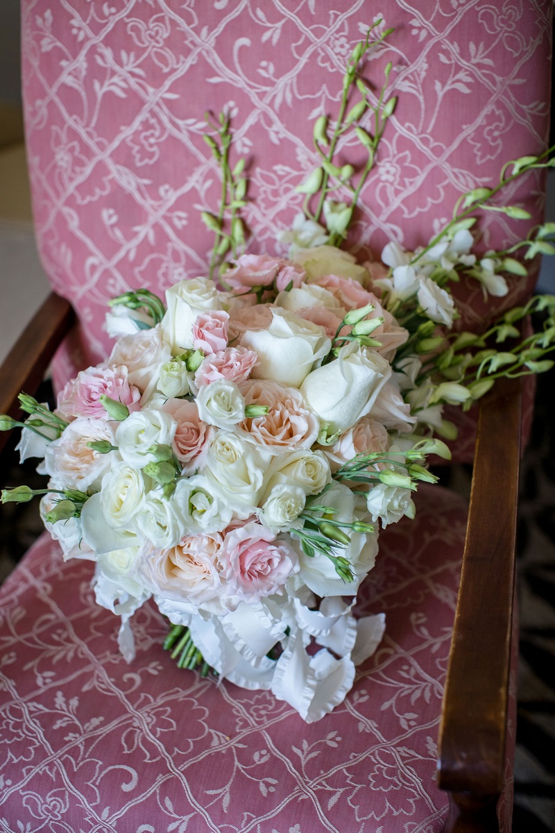 Pale Pink Rose Bridal Bouquet
Photography: Magnolia Studio
Read More:
http://www.insideweddings.com/weddings/charming-church-ceremony-romantic-ballroom-reception-in-quebec/1075/ Wedding bouquet white and pink roses and tall flower accents on pink upholstered chair