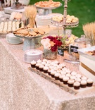 Dessert Display on Rose-Gold, Metallic Linen
Photography: Brian Leahy Photography
Read More:
http://www.insideweddings.com/weddings/rustic-chic-engagement-party-inspiration-at-a-california-farmhouse/935/ dessert display rose gold metallic linen rustic chic wedding professional event cookies cupcakes