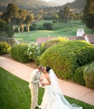 Golf Course Couple
Photography: Michael Segal Photography
Read More:
http://www.insideweddings.com/weddings/rustic-elegant-wedding-in-ojai-valley-california/570/ Bride and groom kiss on lawn with golf course view