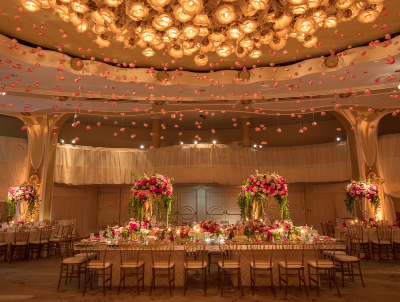 Ballroom Reception with Hanging Roses
Photography: Jay Lawrence Goldman Photography
Read More:
http://www.insideweddings.com/weddings/outdoor-ceremony-ballroom-reception-with-pink-flowers-greenery/1135/ Wedding reception at the beverly hills hotel ballroom crystal chandelier with pink roses hanging